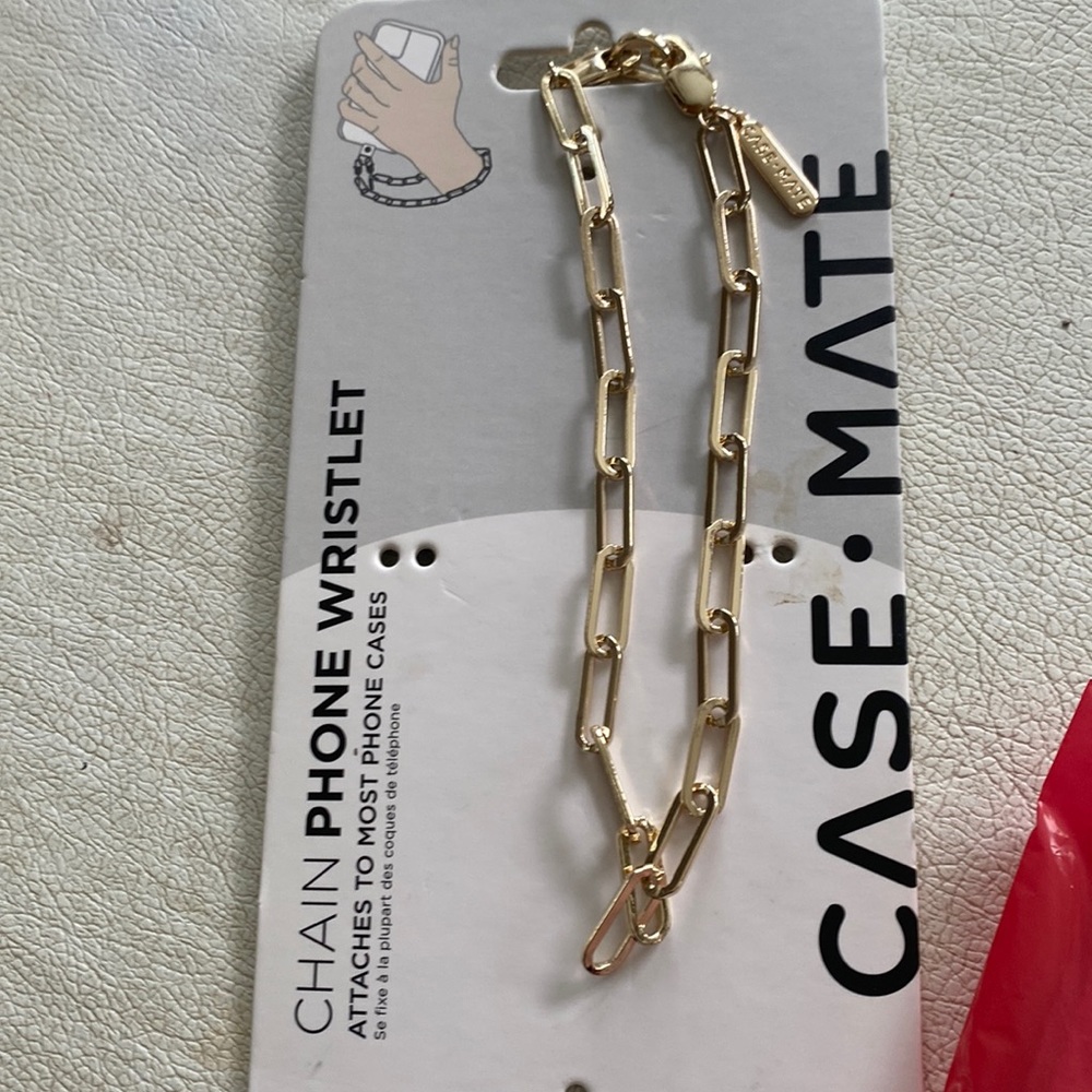 Case mate. Chain phone wristlet gold